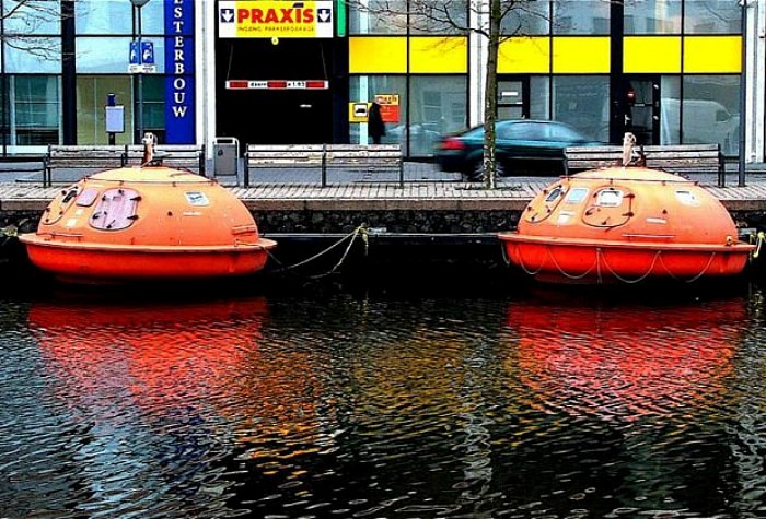 Orange oil rig escape pods as hotel rooms